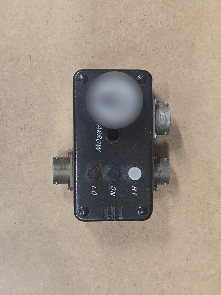 Black cable checker with LO, ON and HI indicator lights and three round connectors